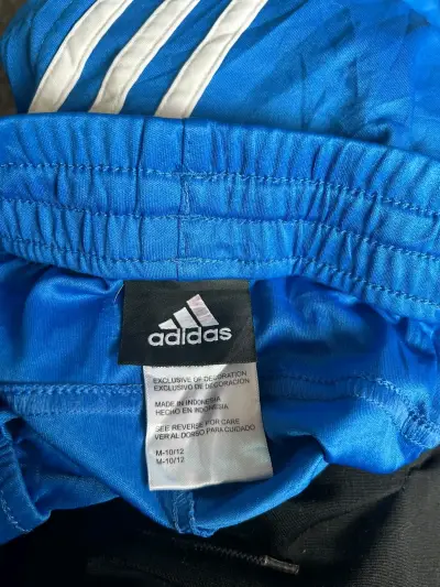 Pantalones deportivos azules Adidas con franjas - miniatura 2