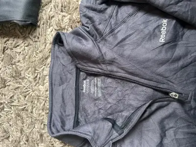 Polerón deportivo gris Reebok con cierre - miniatura 2