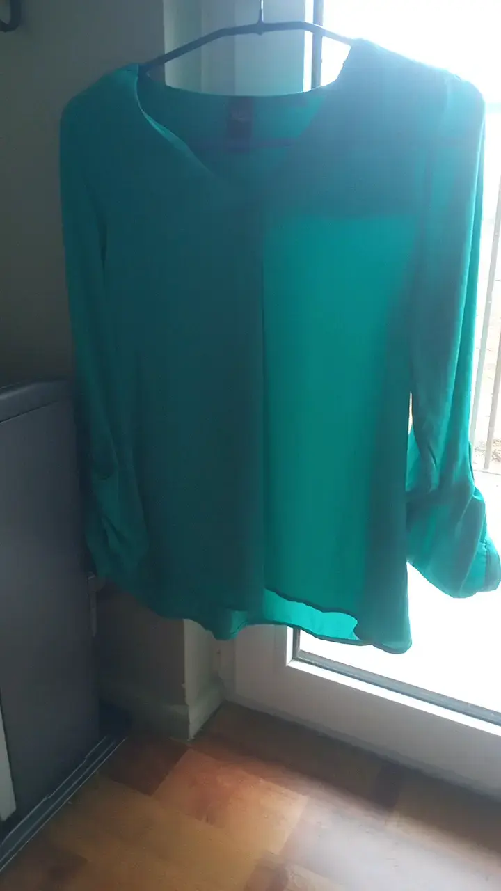Blusa verde turquesa de manga larga
