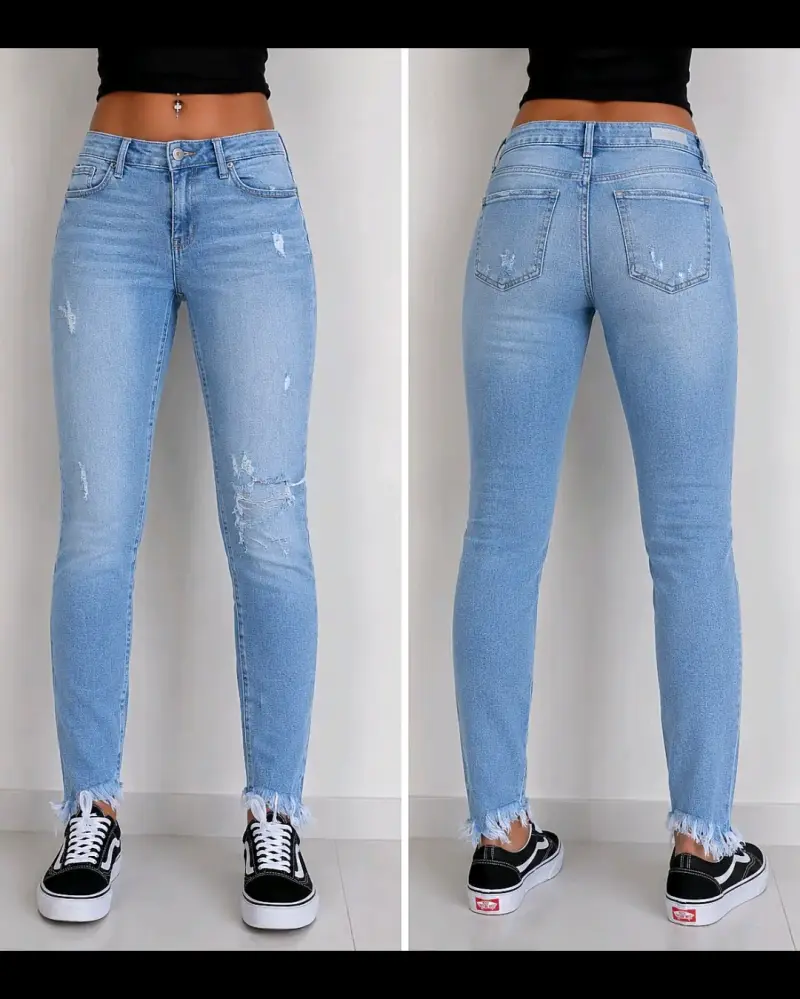 Jeans de mezclilla azul claro con detalles desgastados - 2