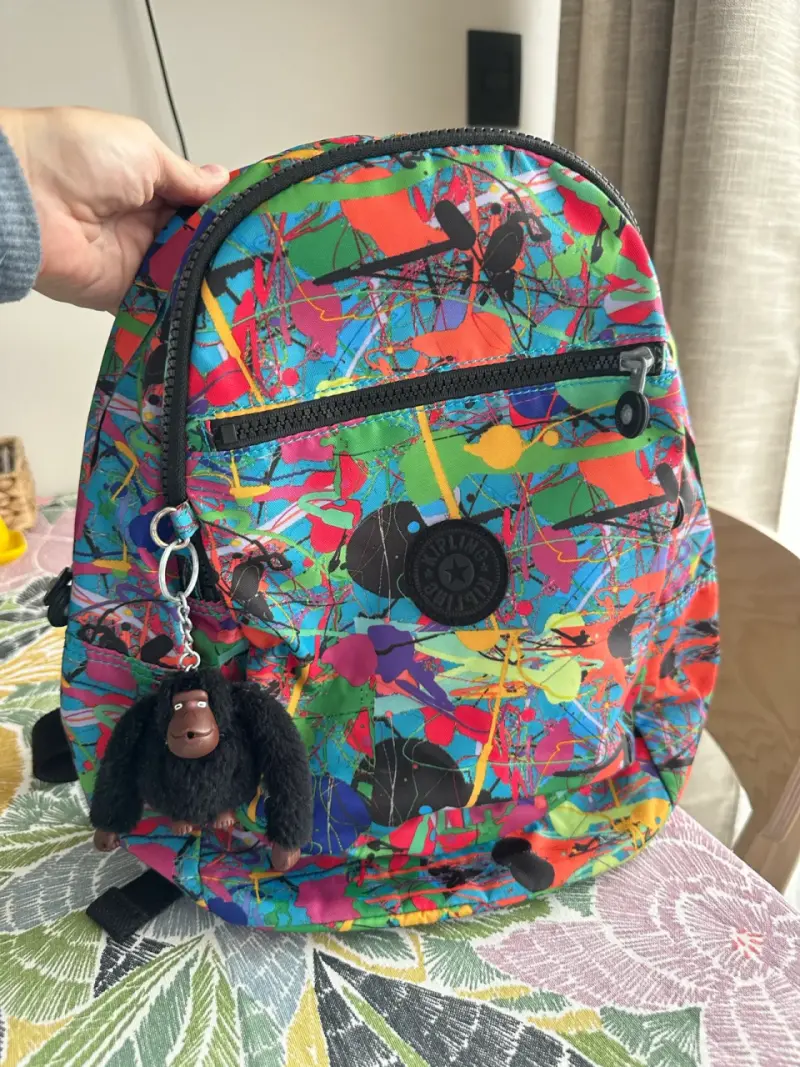 Mochila Kipling colorida con llavero de mono - 1