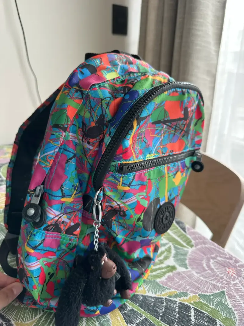 Mochila Kipling colorida con llavero de mono - 2