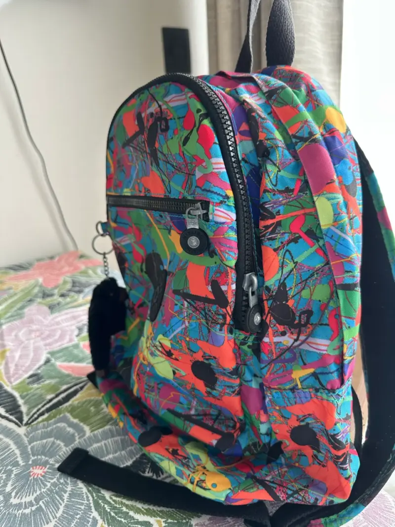 Mochila Kipling colorida con llavero de mono - 4