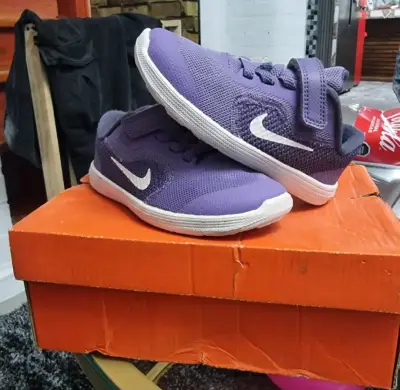 Zapatillas deportivas moradas para niños Nike - miniatura 1