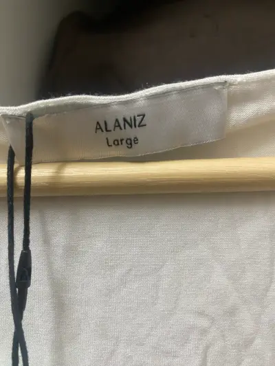 Polera sin mangas Alaniz blanca talla L - miniatura 1