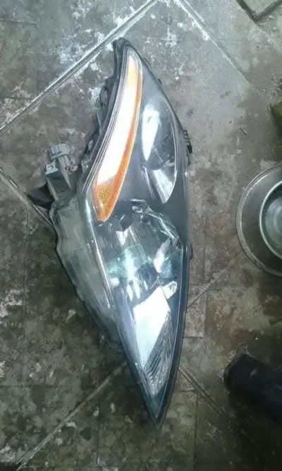Foco delantero original nissan murano 2010 - miniatura 1