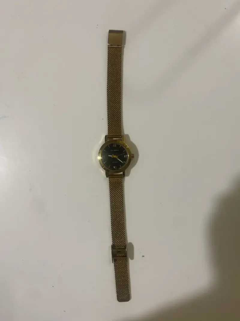 Reloj dorado con correa metálica SIN PILAS - 1