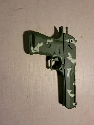 Pistola de juguete camuflaje verde - miniatura 1