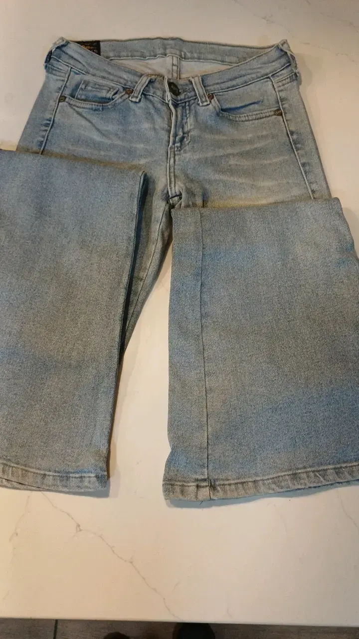 Jeans Lee de mezclilla azul claro para mujer