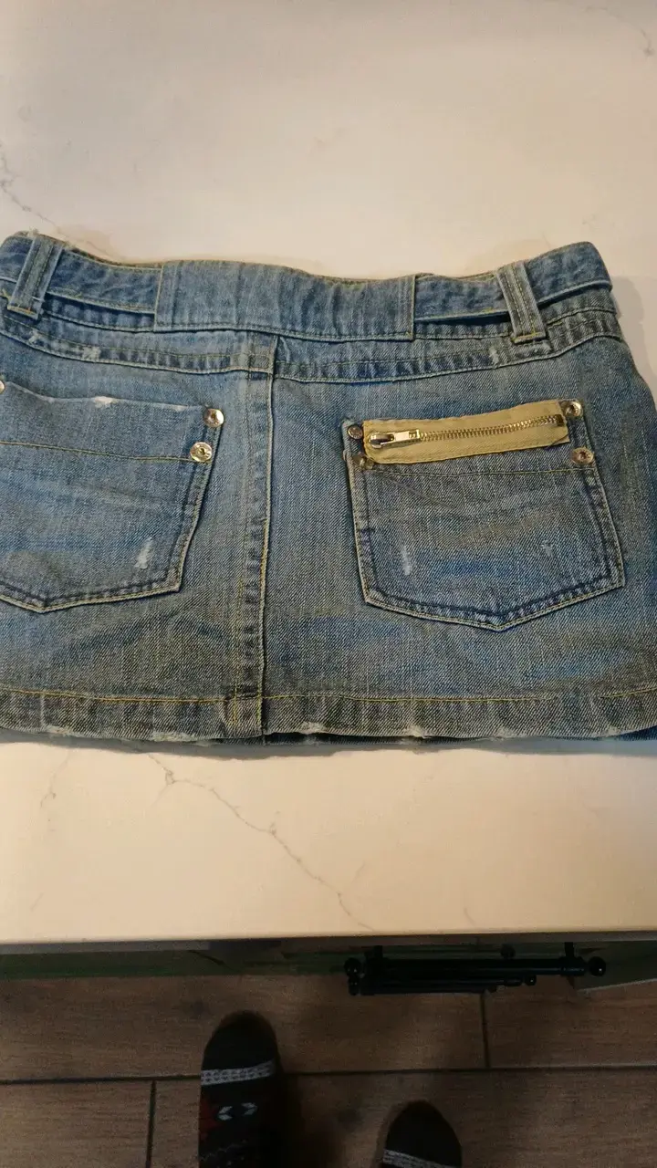 Falda de mezclilla azul con bolsillos - 2