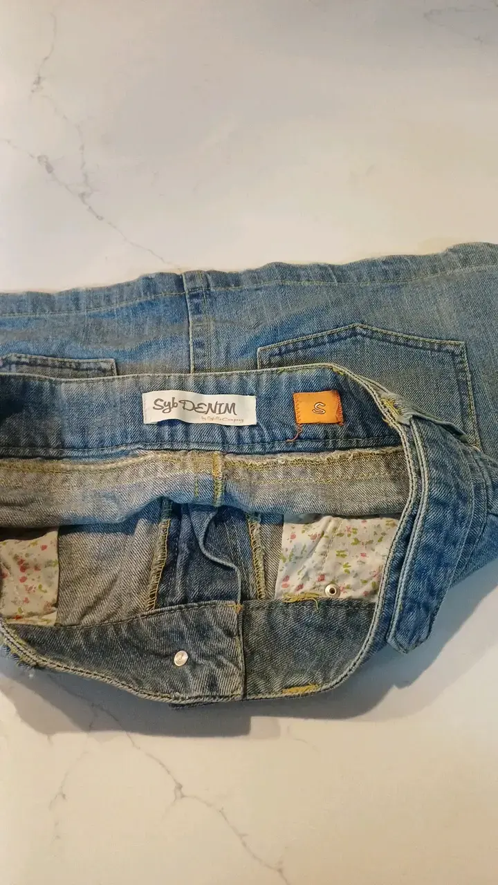 Falda de mezclilla azul con bolsillos - 3