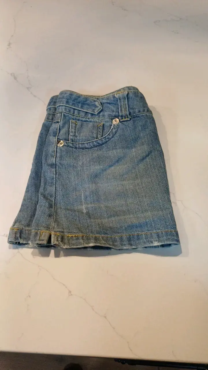 Falda de mezclilla azul con bolsillos - 6