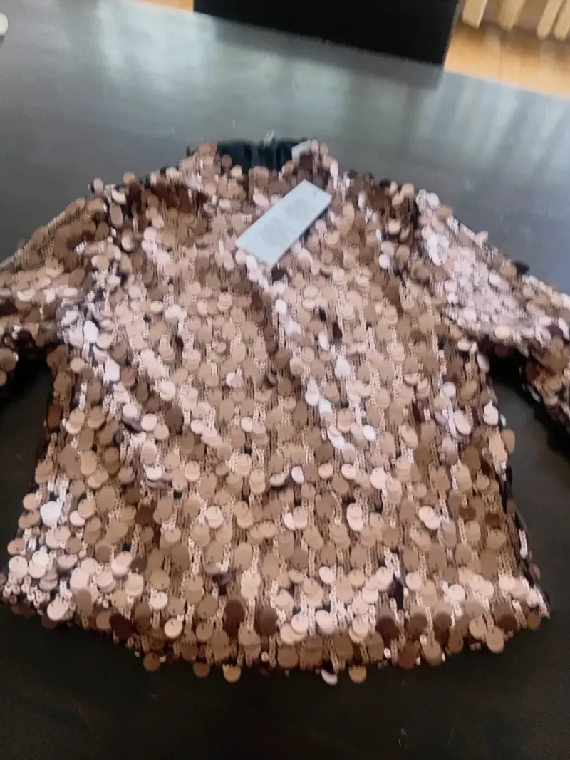 Blusa de lentejuelas doradas para fiesta