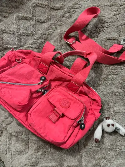 Bolso Kipling rosado  con múltiples bolsillos - miniatura 1