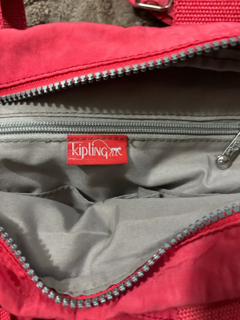 Bolso Kipling rosado con múltiples bolsillos - 2