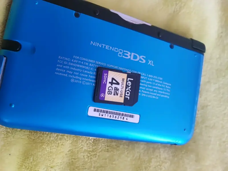 Nintendo 3DS XL azul con juegos y accesorios - 1