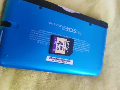 Nintendo 3DS XL azul con juegos y accesorios - miniatura 1