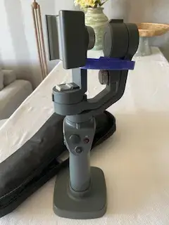 Estabilizador de cámara para smartphone con funda - miniatura 1