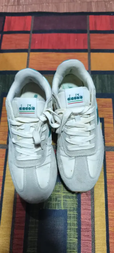 Zapatillas deportivas Diadora blancas y celestes - miniatura 1