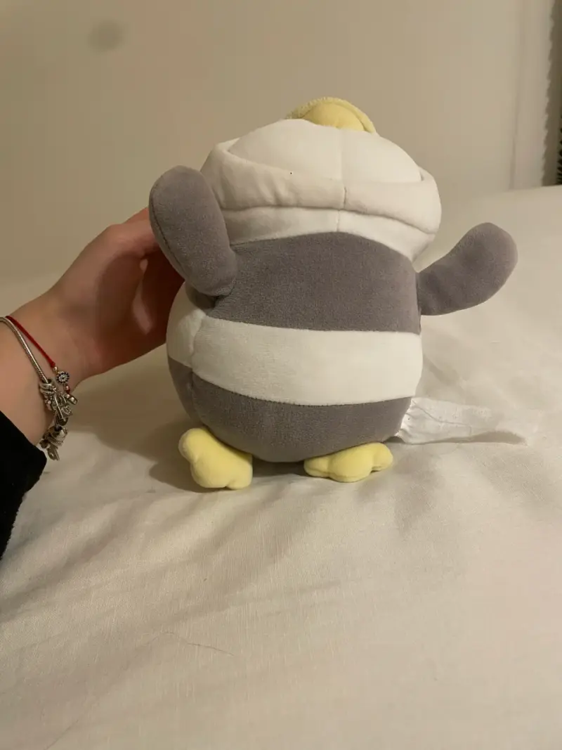 Peluche de sr. miniso disfrazado de panda - 4