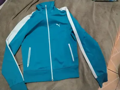 Chaqueta deportiva azul con franjas blancas - miniatura 1