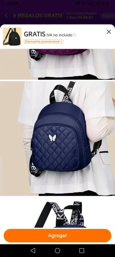 Mochila azul con diseño acolchado y mariposa - miniatura 1