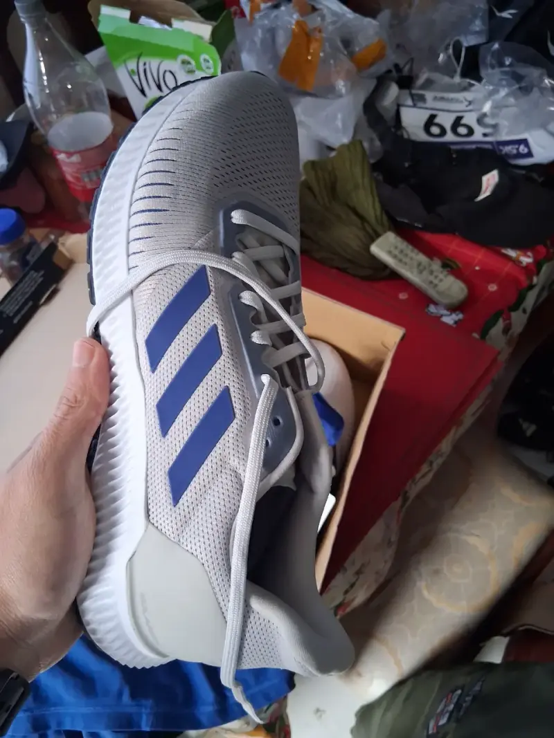 Zapatillas deportivas Adidas blancas con detalles azules - 4