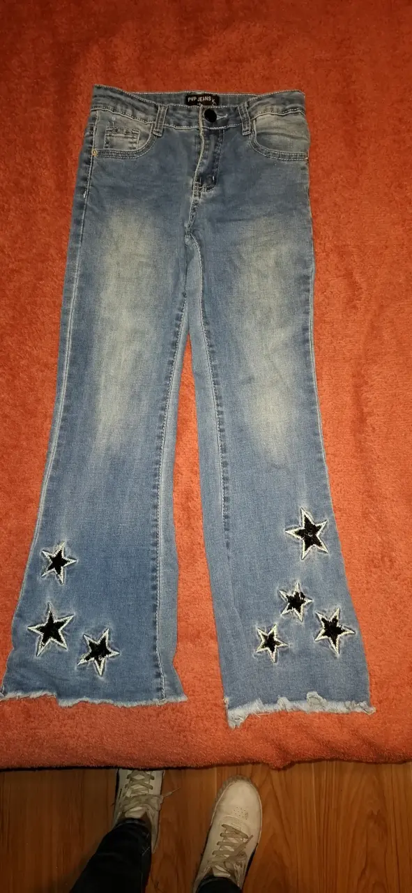 Jeans acampanados de mezclilla azul desgastados - 4