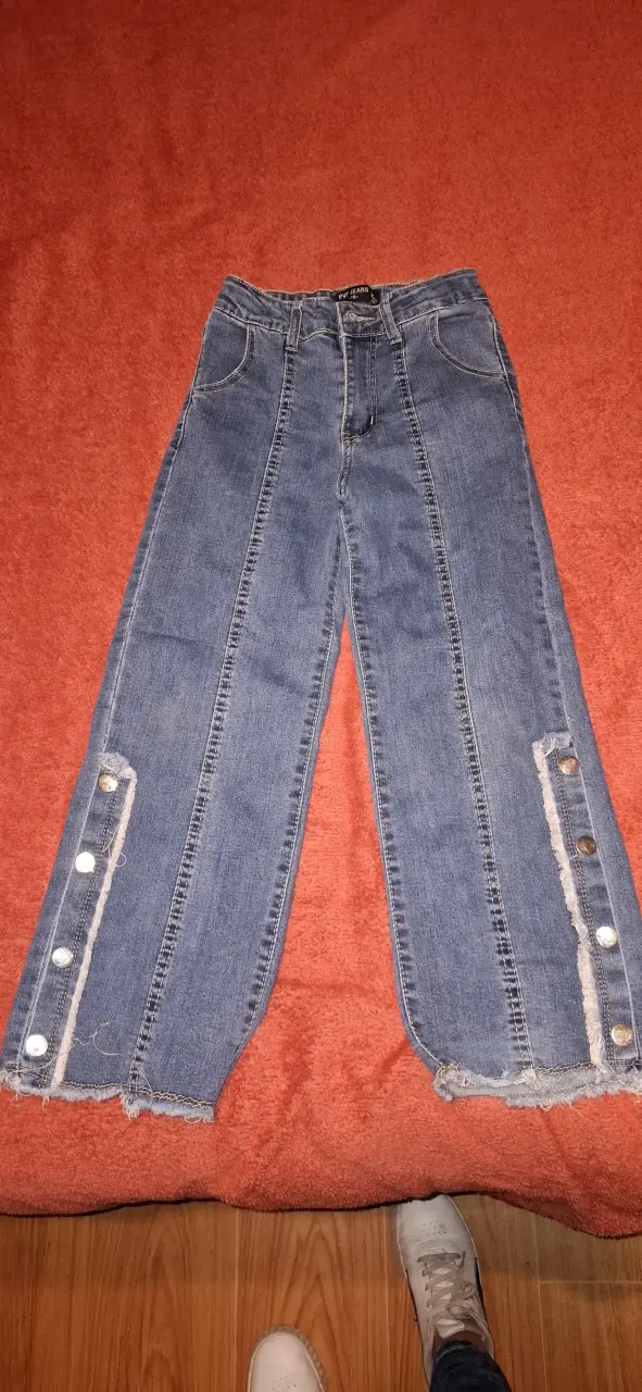 Jeans acampanados de mezclilla azul desgastados - 5
