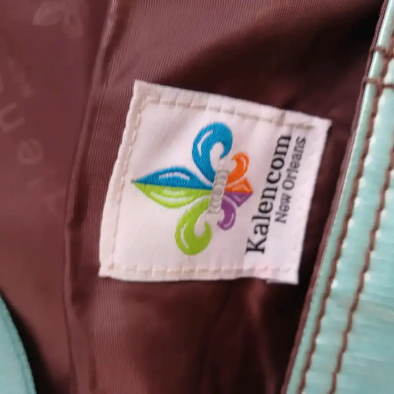 Bolso de pañales Kalencom verde agua - 1