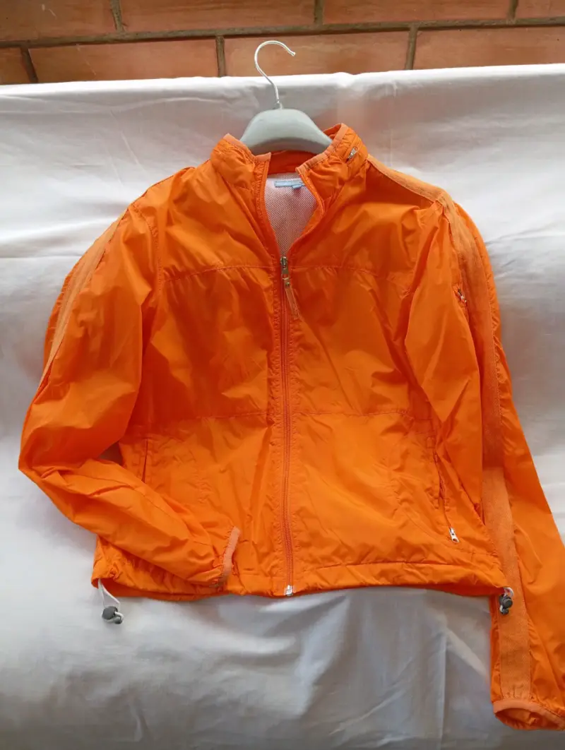 Chaqueta cortaviento naranja para mujer