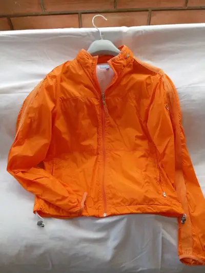 Chaqueta cortaviento naranja para mujer - miniatura 1