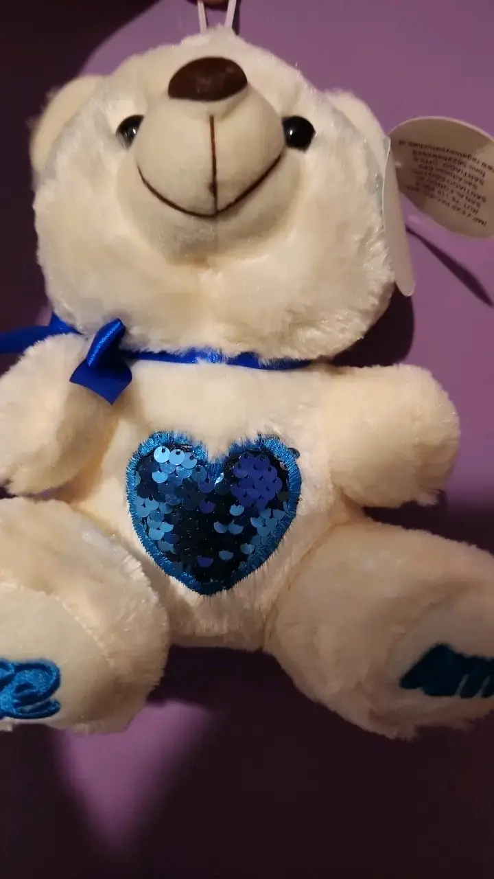 Peluche oso blanco con corazón azul - 1