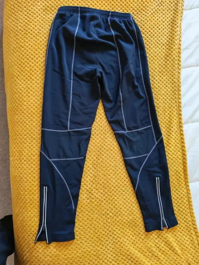 Pantalones deportivos Nike azul con cierre - miniatura 1