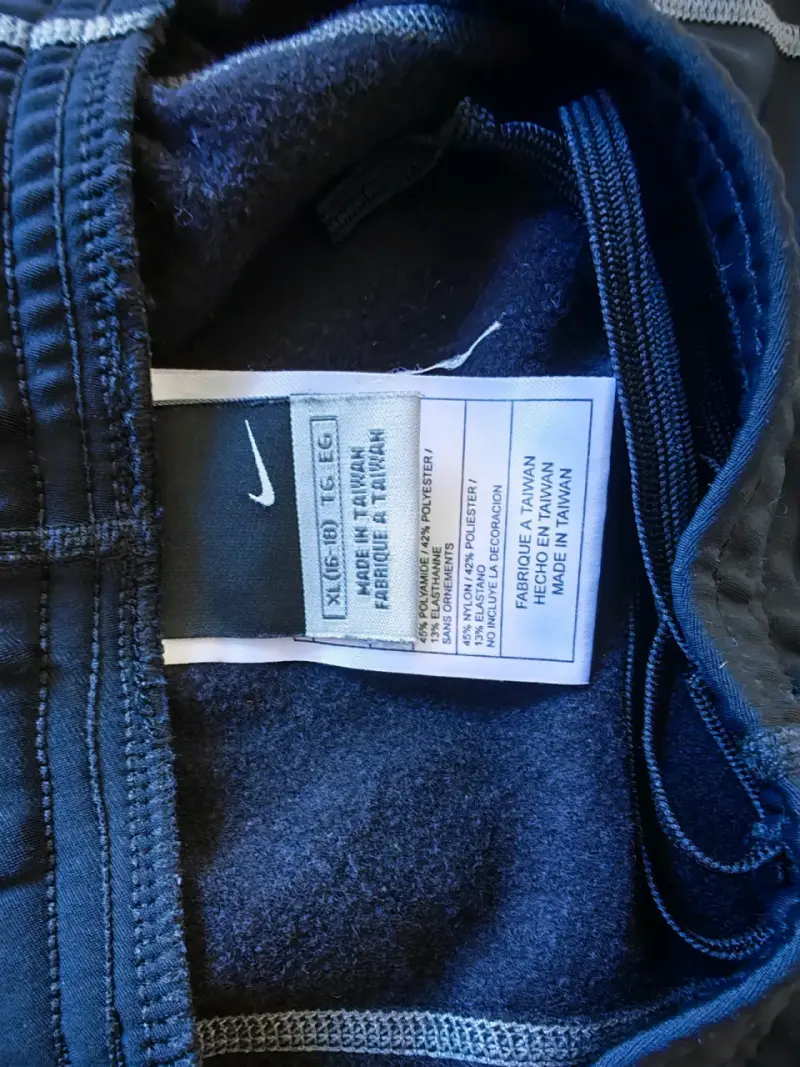 Pantalones deportivos Nike azul con cierre - 3