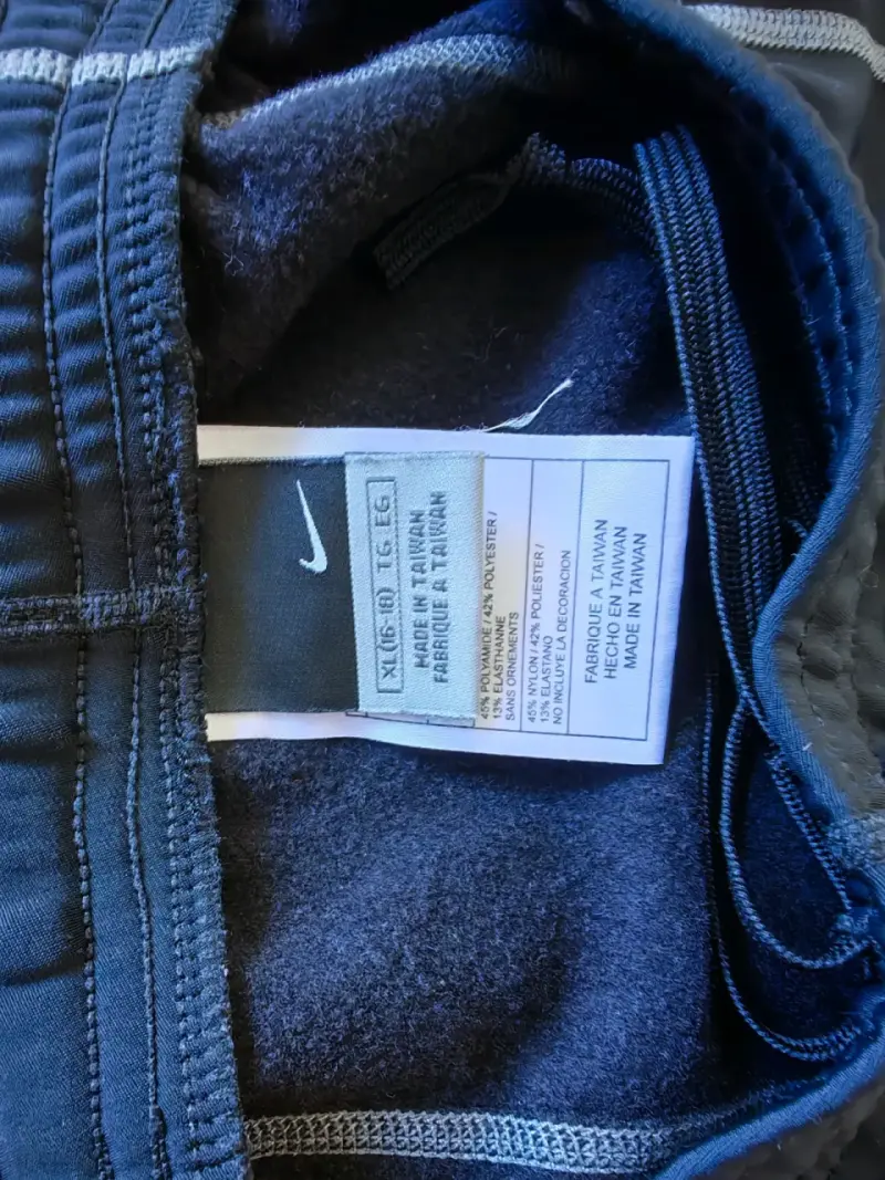 Pantalones deportivos Nike azul con cierre - 4