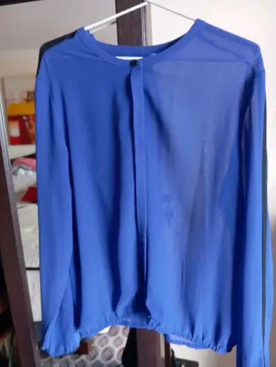 Blusa azul de gasa para mujer - miniatura 1