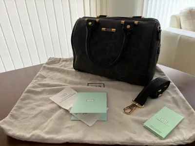 Bolso de mano Tous negro con detalles dorados - miniatura 1