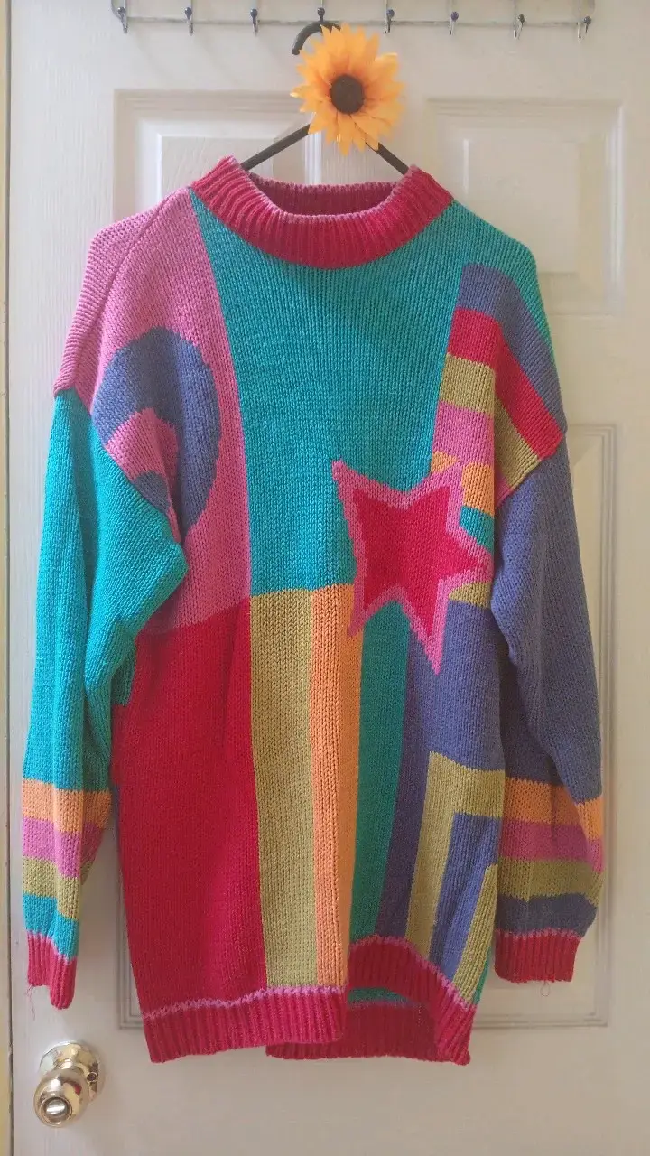 Suéter colorido de diseño geométrico