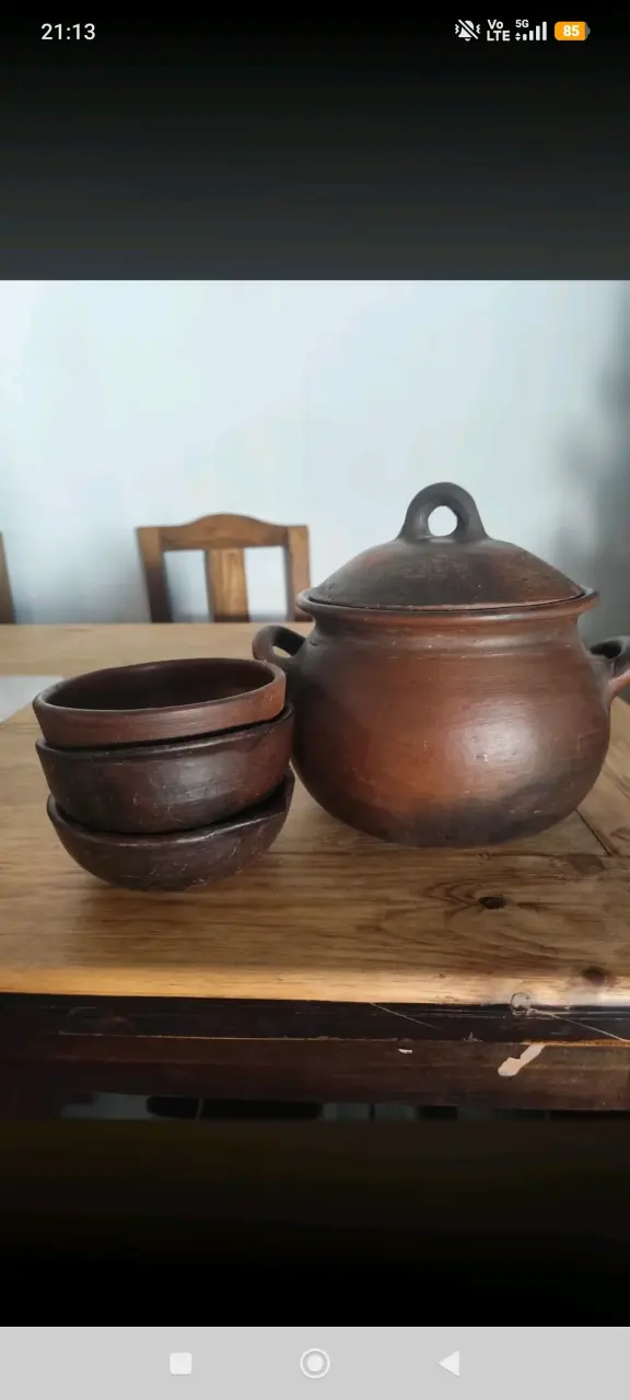 Juego de ollas de greda con tazones