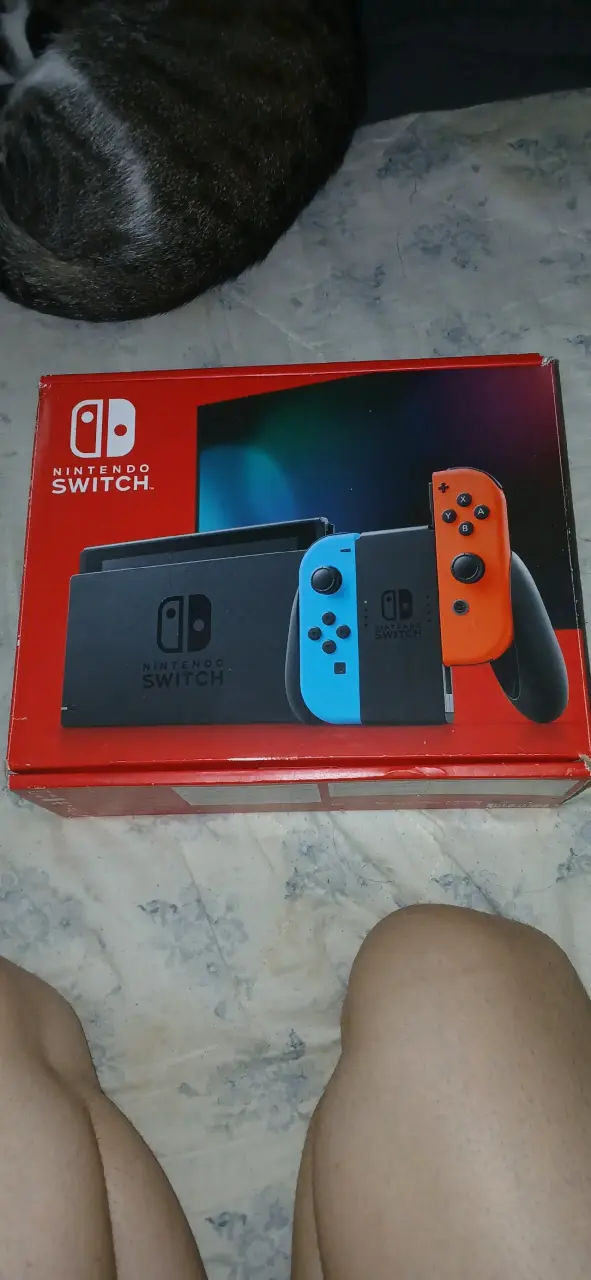 Nintendo Switch v2 con estuche + Sd 32GB + cap.USB - 1