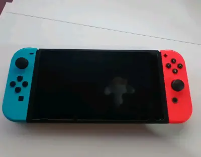 Nintendo Switch v2 con estuche + Sd 32GB + cap.USB - miniatura 6