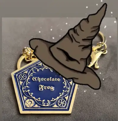 Llavero Chocolate Frog dorado y azul - miniatura 2