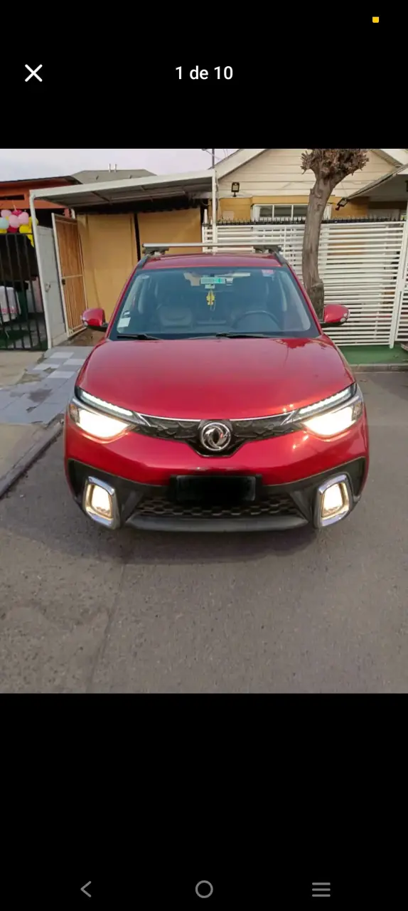 SUV rojo en buen estado con interior moderno - 4