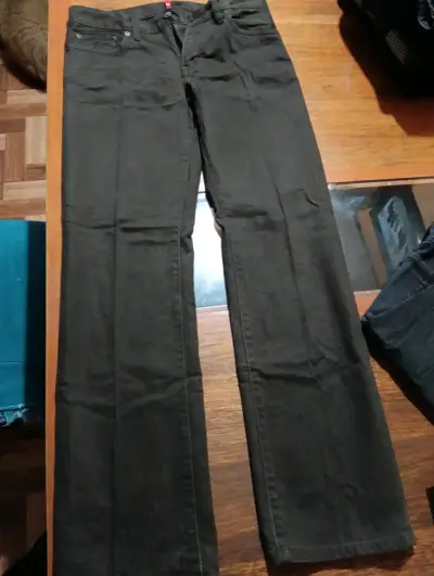 Jeans negros para hombre en buen estado - miniatura 1