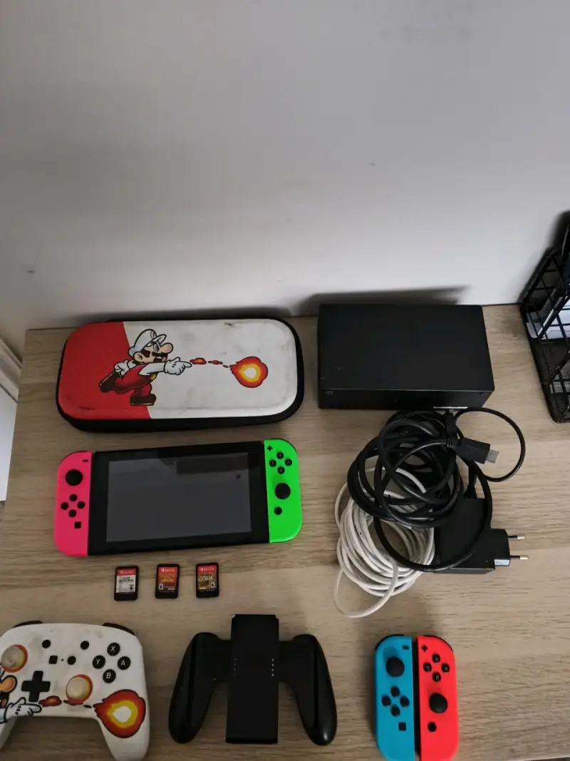 Consola Nintendo Switch con accesorios y juegos