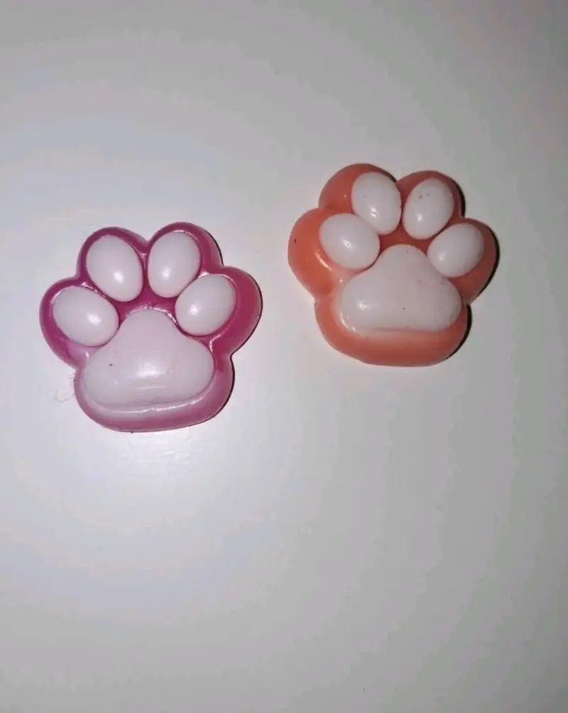 Juguetes de goma en forma de pata para mascotas