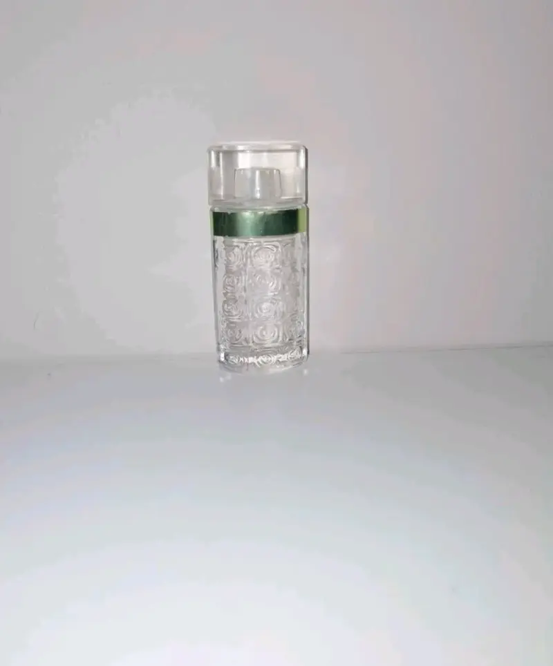 Mini perfume de mujer con diseño floral (Vacio)