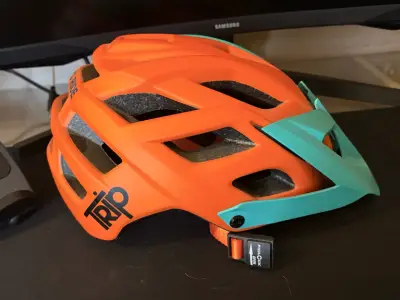 Casco de bicicleta TRIP naranja y turquesa L-xl - miniatura 1