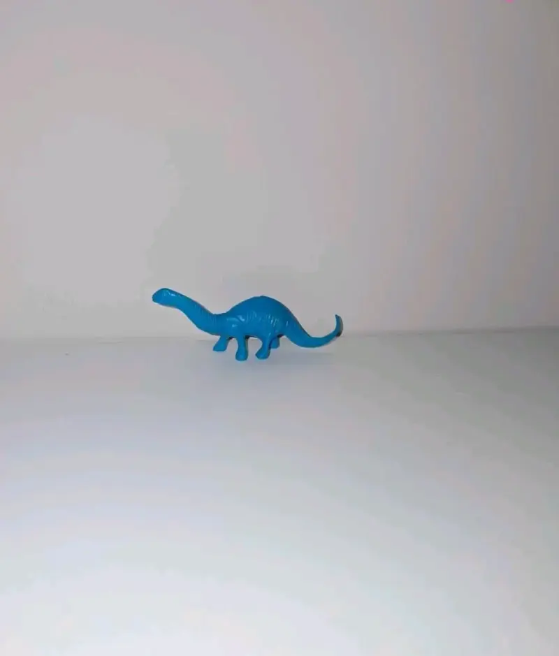 Figura de dinosaurio azul para niños